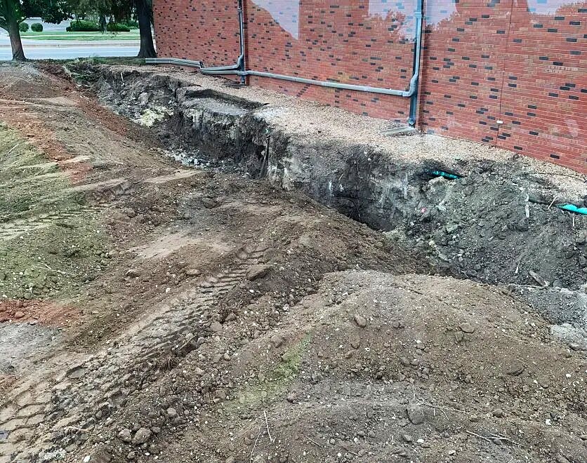 Foundation Excavation — Brick Building — During — Excavation Along Wall