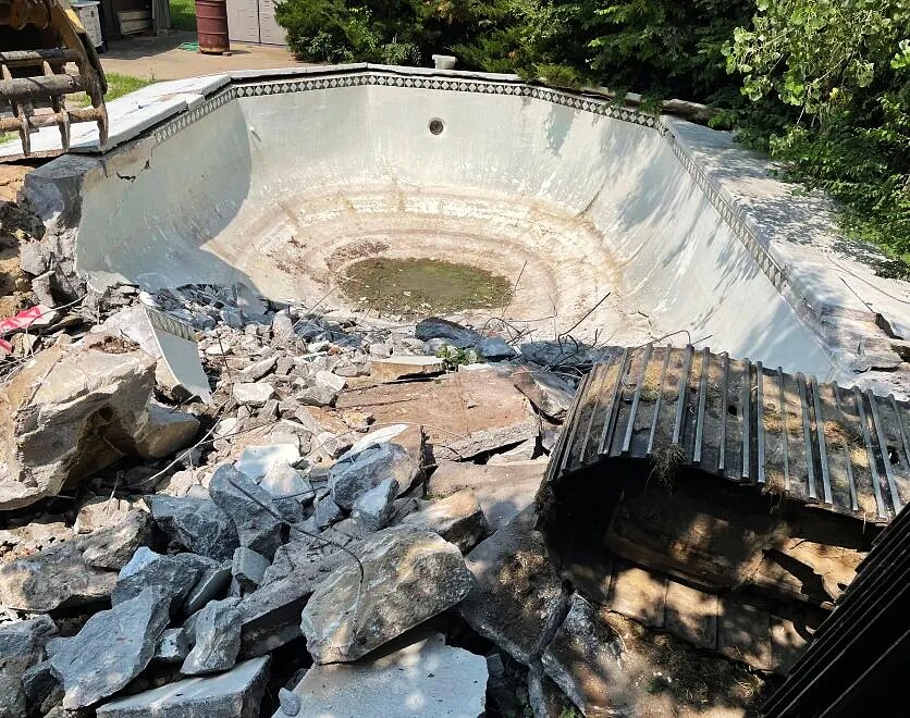 In-Ground Pool Removal & Backfill — During — Pool Broken Out