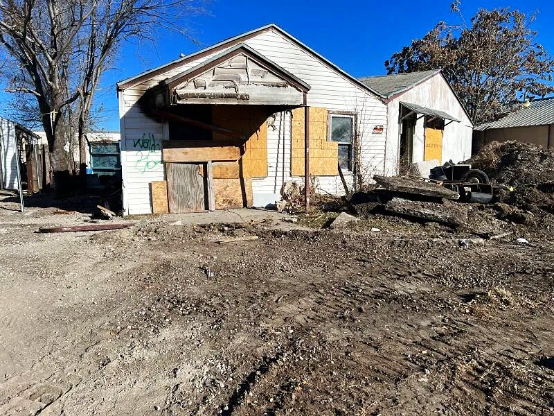 Boarded Residential Tear-Down — Before — Boarded Front